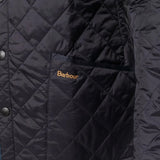 Close up of black jackets, showing texture of the polyester and cotton fabric