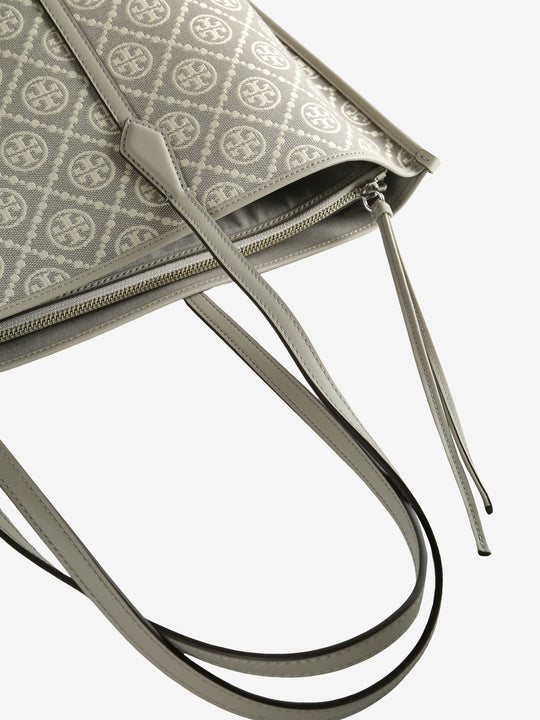 Close up of the grey bag, showing texture of the leather fabric