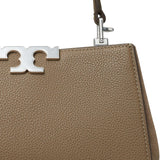 Close up of brown bag, showing texture of the leather fabric