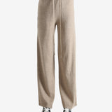 Beige pants worn by a person, showing the pants fit