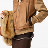 Brown jacket  worn by a person, showing the jacket 's fit