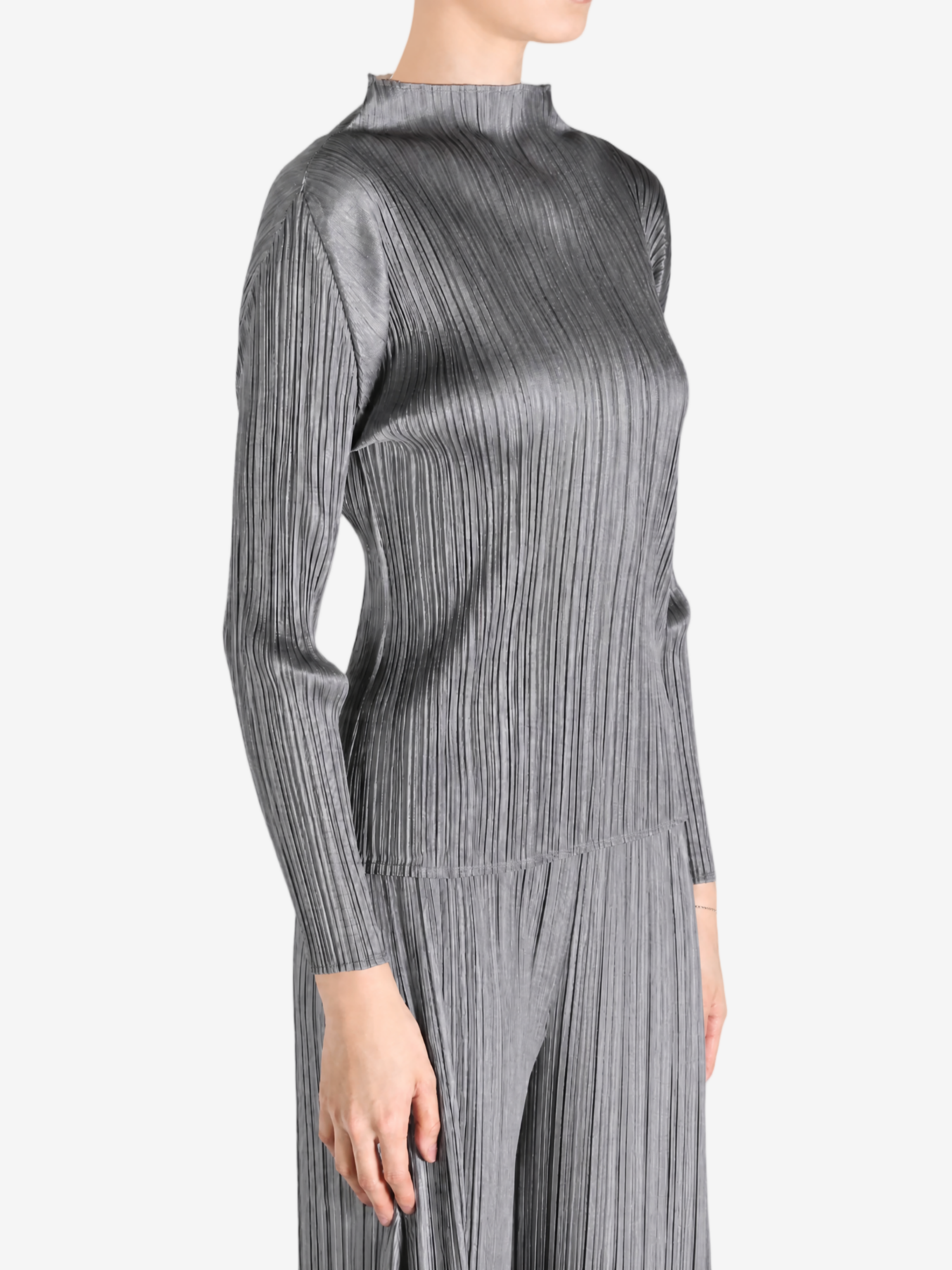 Grey shirt worn by a person, showing the shirt fit