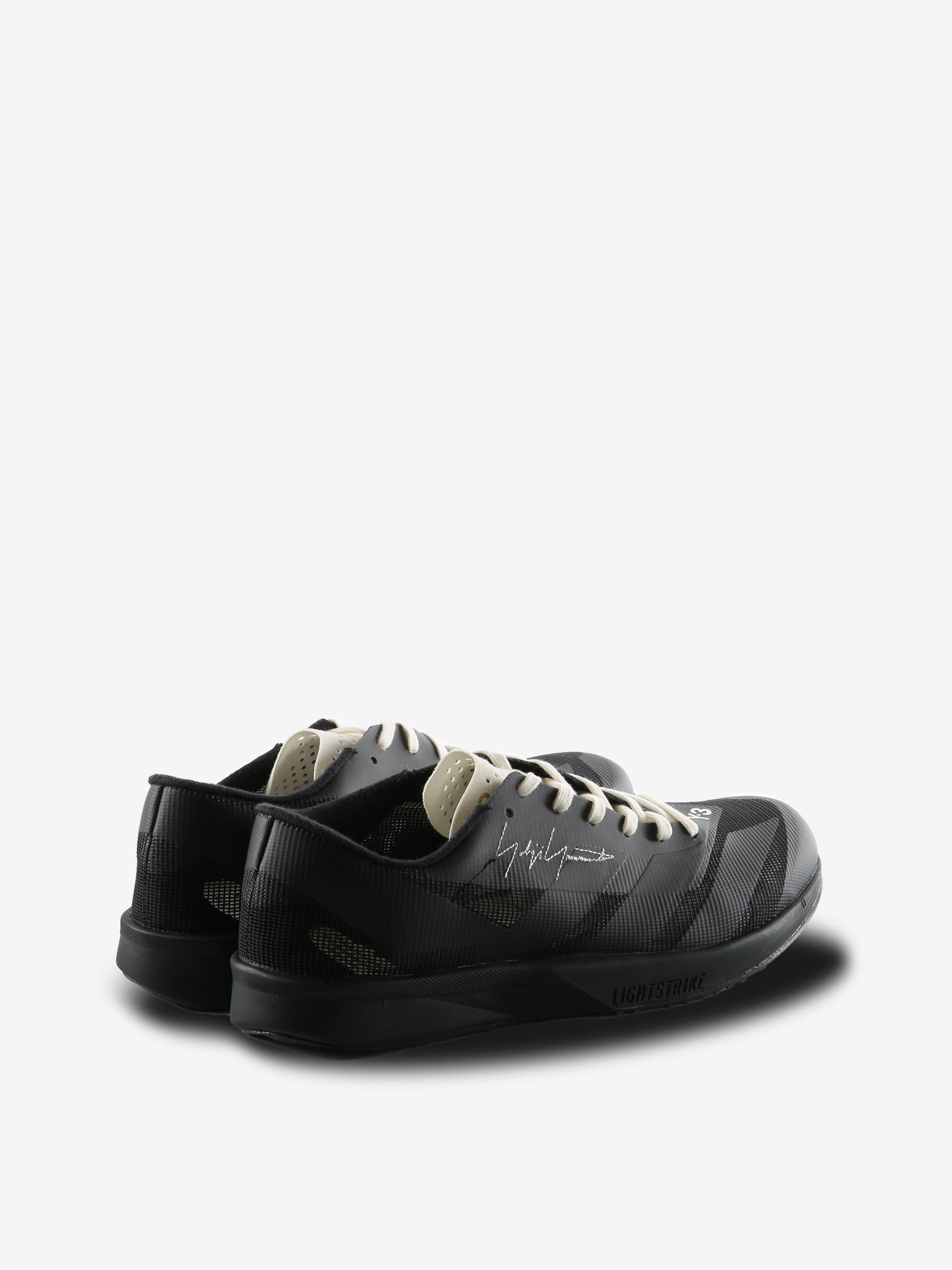 Black sneakers, back view