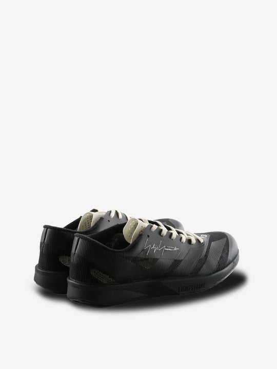 Black sneakers, back view