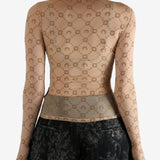 Tan top worn by a person, showing the top fit