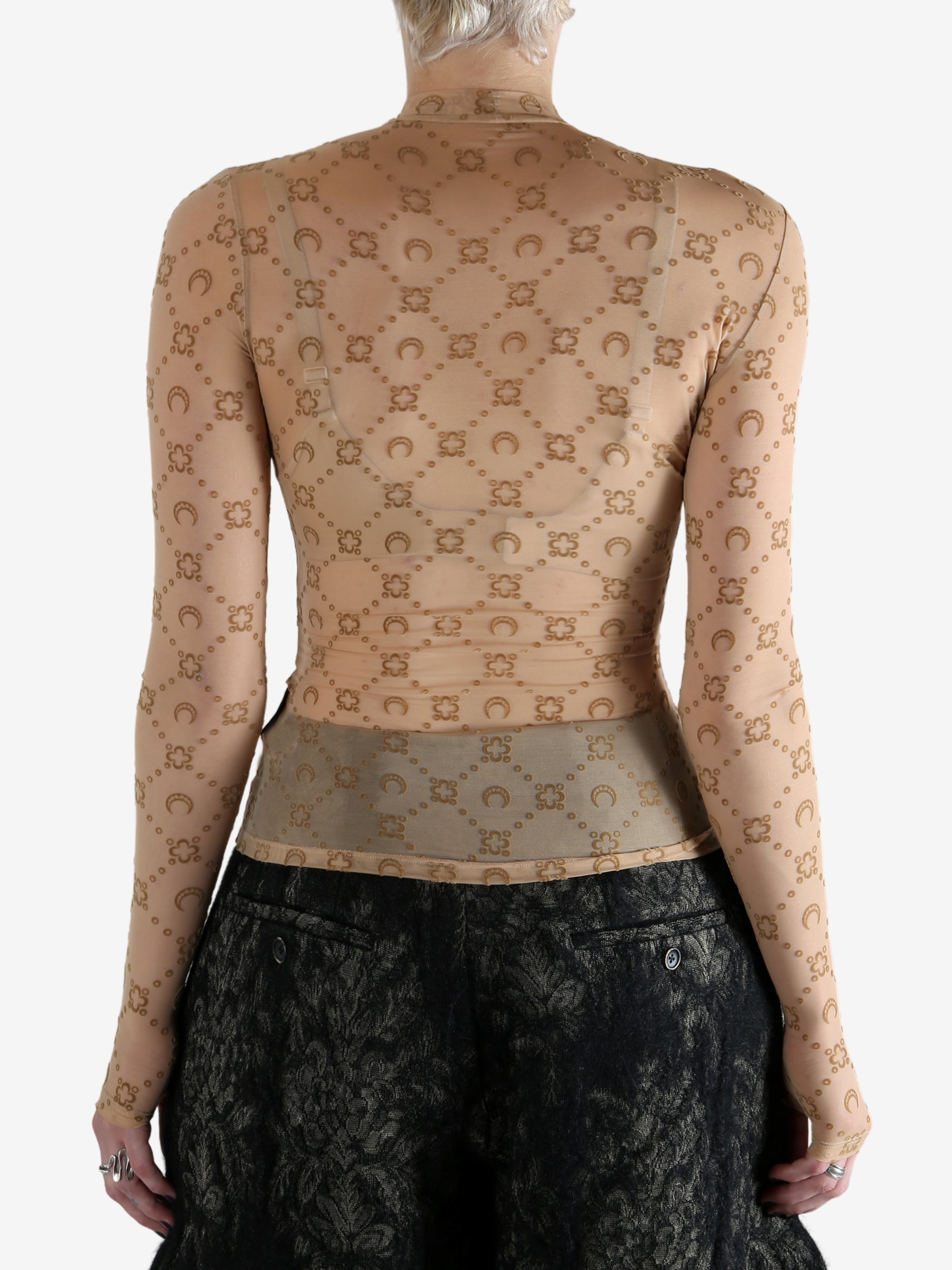 Tan top worn by a person, showing the top fit