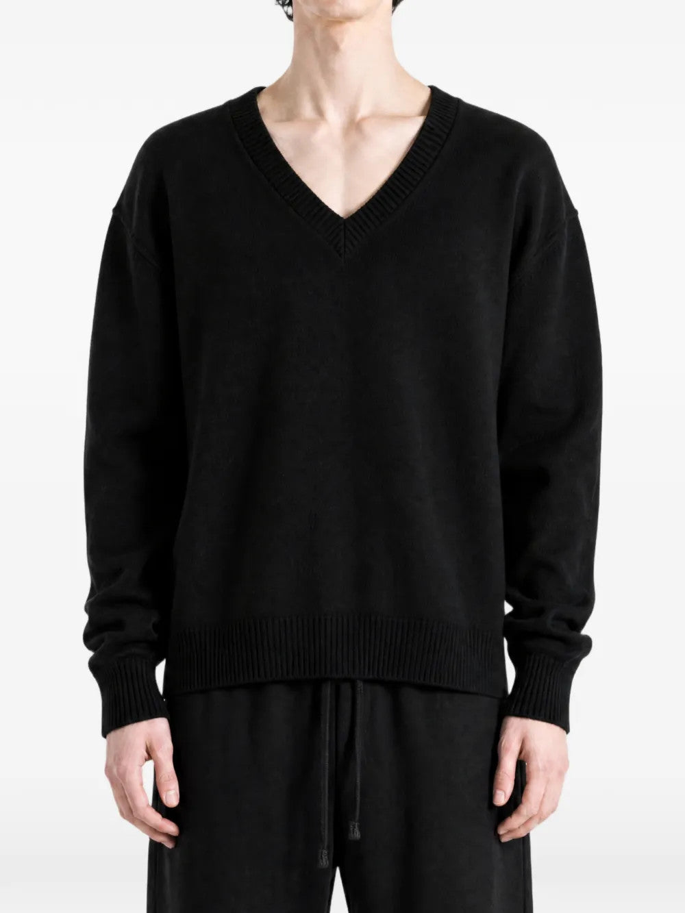 Black knitwear, full body view