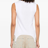 White top worn by a person, showing the top's fit