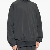 grey jacket worn by a person, showing the  jacket fit