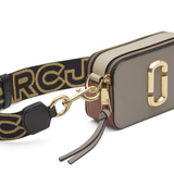 close up of grey  bags, showing texture of the leather fabric