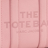 Close up of pink bag, showing texture of the leather fabric