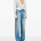 blue jeans worn by a person, showing the jeans fit