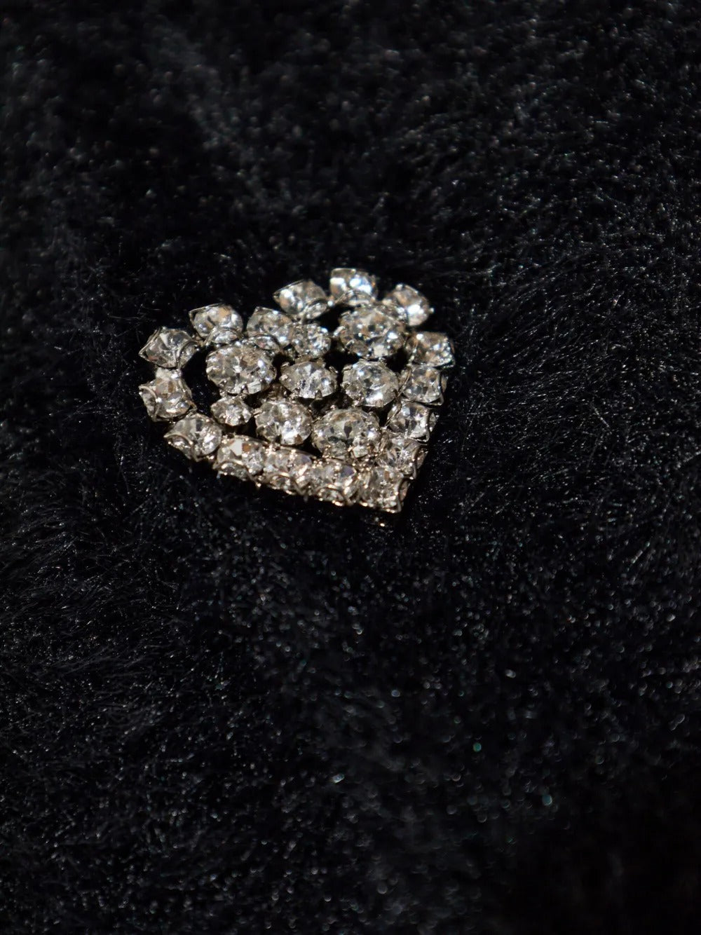 Close up of black knitwear, showing texture of the polyamide fabric