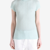 Blue shirt worn by a person, showing the shirt fit