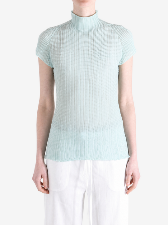 Blue shirt worn by a person, showing the shirt fit