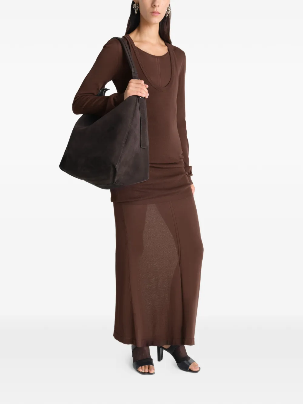Brown bag worn by a person, showing the bag fit