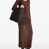 Brown bag worn by a person, showing the bag fit