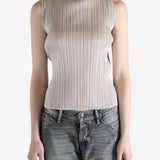 Grey tops worn by a person, showing the  tops fit