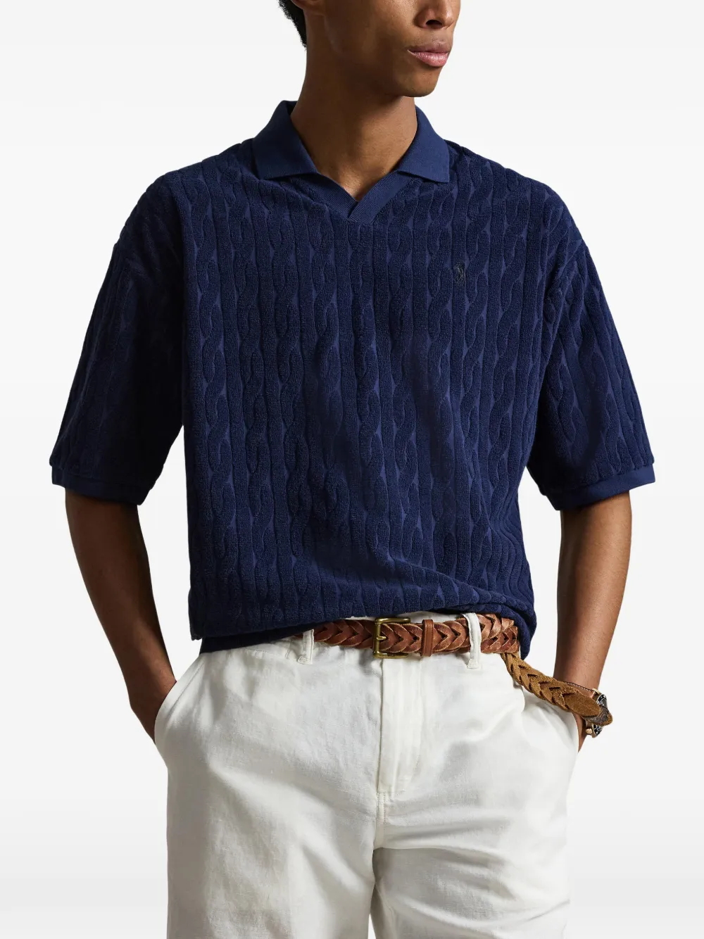 Blue shirt worn by a person, showing the shirt fit