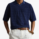 Blue shirt worn by a person, showing the shirt fit