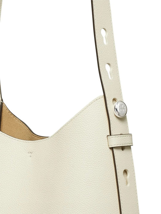Close up of the white bag, showing texture of the leather fabric