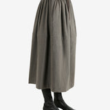 Grey skirt worn by a person, showing the skirt fit
