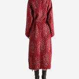 Red jackets worn by a person, showing the jackets fit