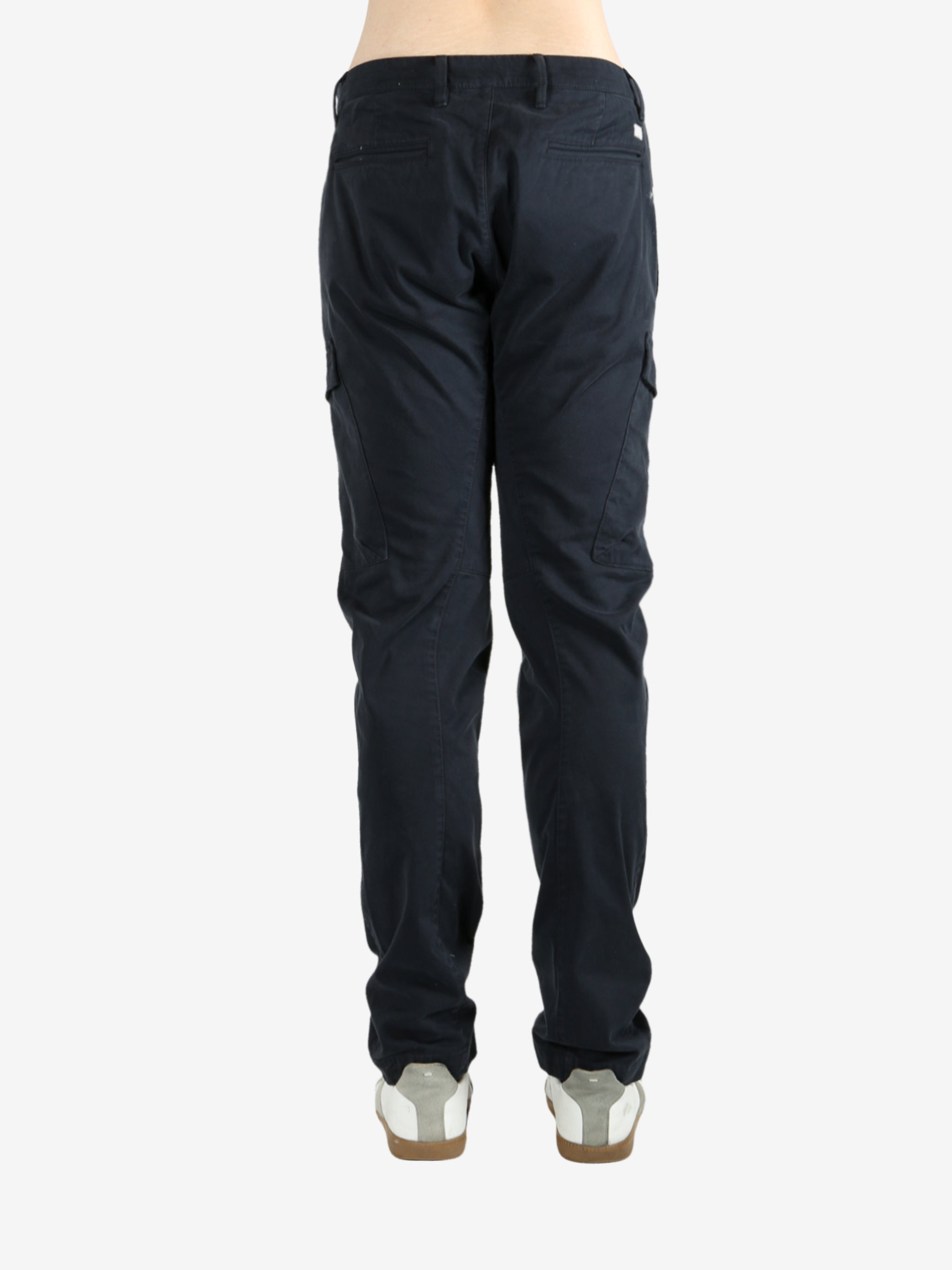 Blue pants worn by a person, showing the pants fit