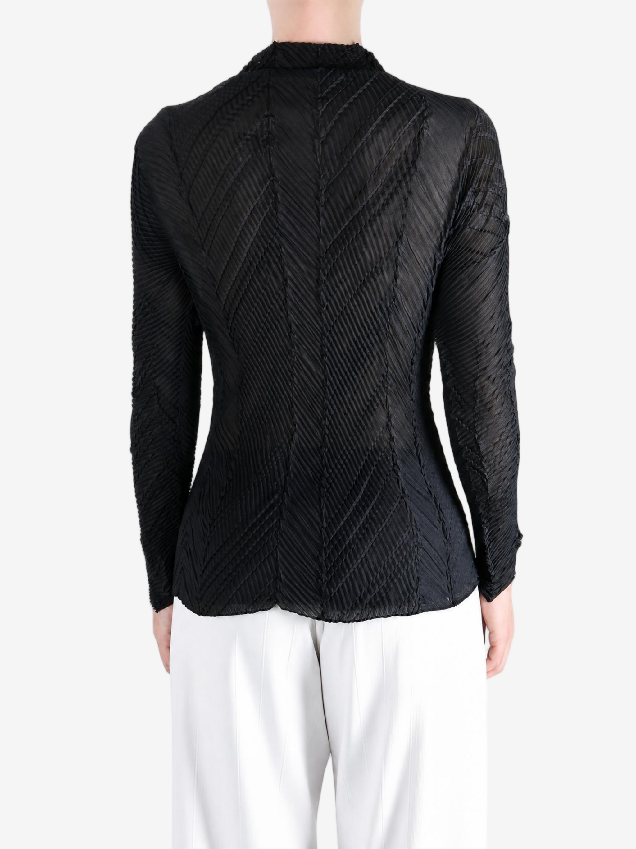Black shirt worn by a person, showing the shirt fit