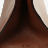 Close up of brown bags, showing texture of the fabric