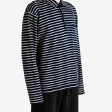 Navy shirt worn by a person, showing the shirt fit