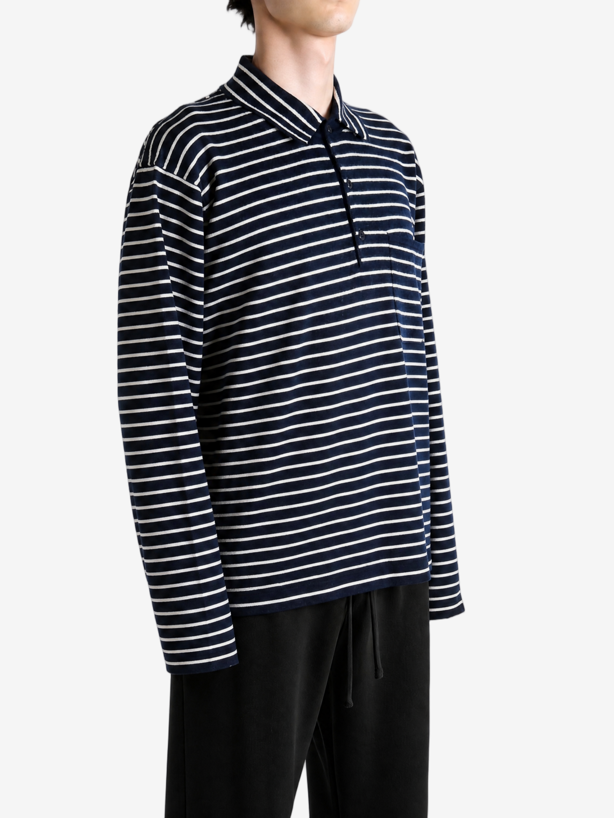 Navy shirt worn by a person, showing the shirt fit