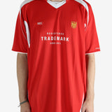 Red t-shirt worn by a person, showing the shirt's fit