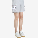 Grey pants worn by a person, showing the pants' fit