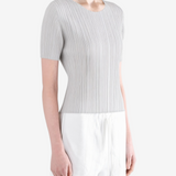 Grey shirt worn by a person, showing the shirt fit