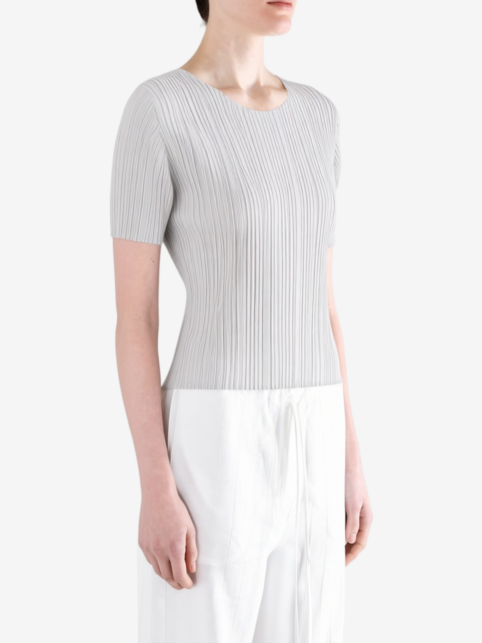 Grey shirt worn by a person, showing the shirt fit