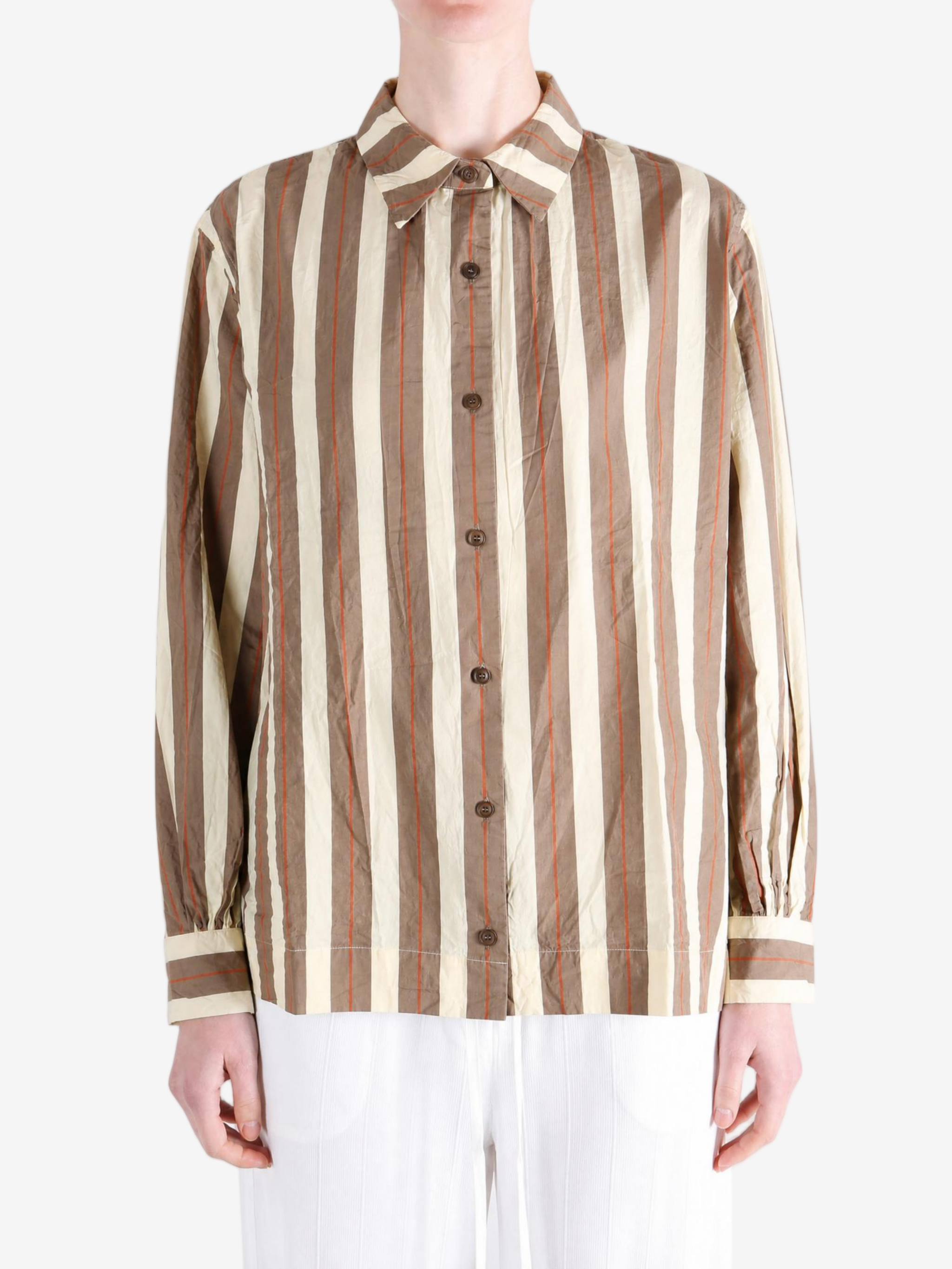Brown shirt worn by a person, showing the shirt fit