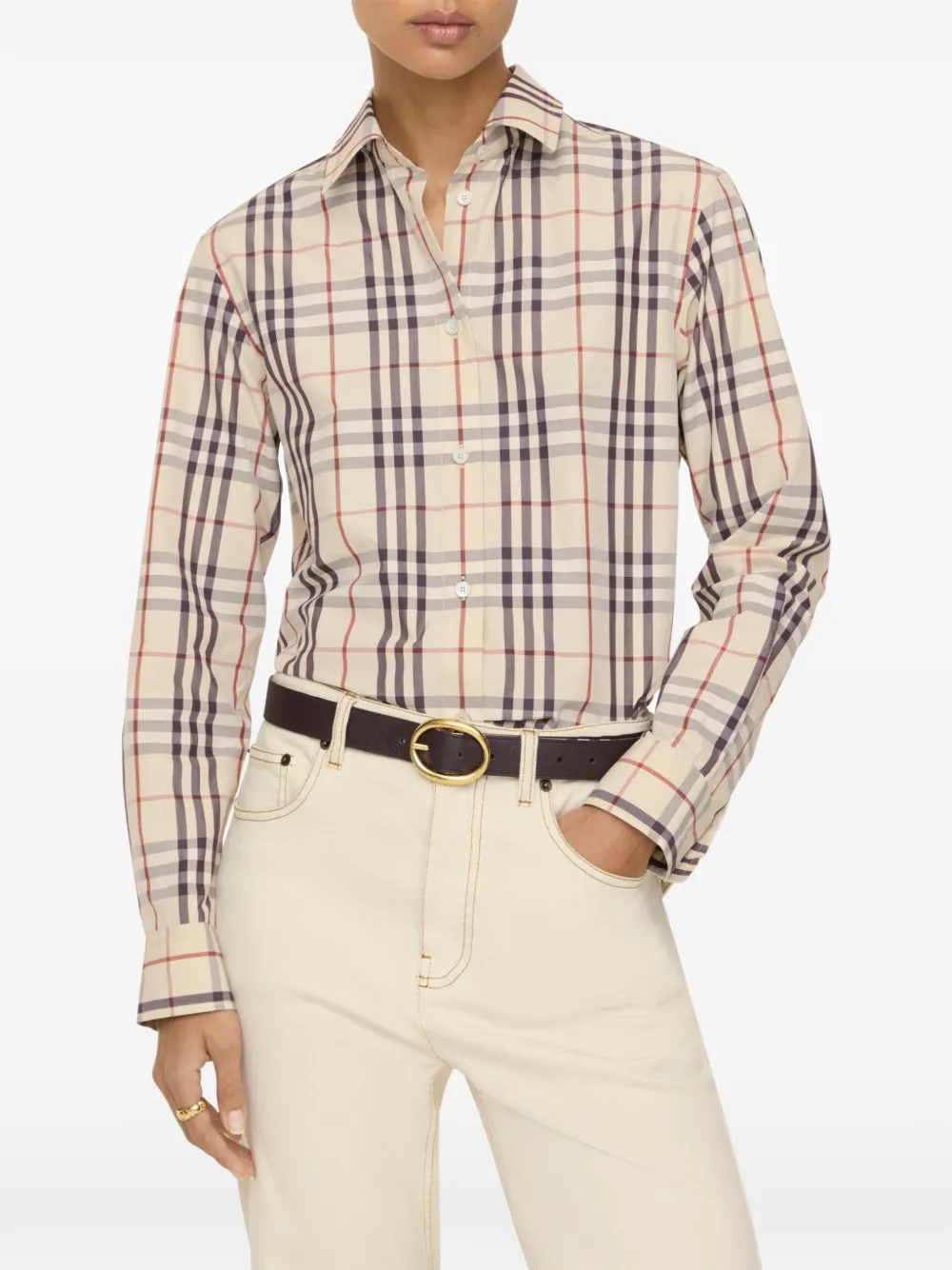 Tan shirts worn by a person, showing the shirts fit