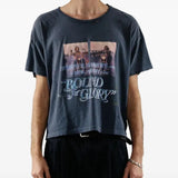 Black t-shirt worn by a person, showing the shirt's fit