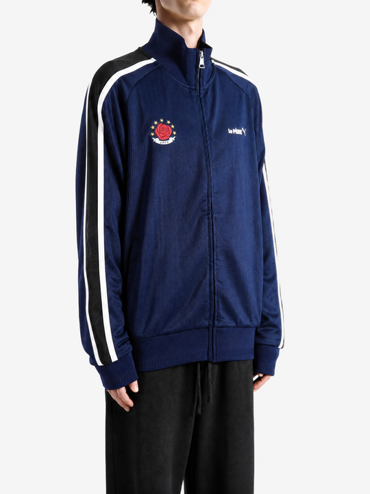 Navy jacket worn by a person, showing the jacket fit