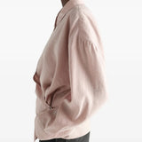 Pink dress worn by a person, showing the dress fit