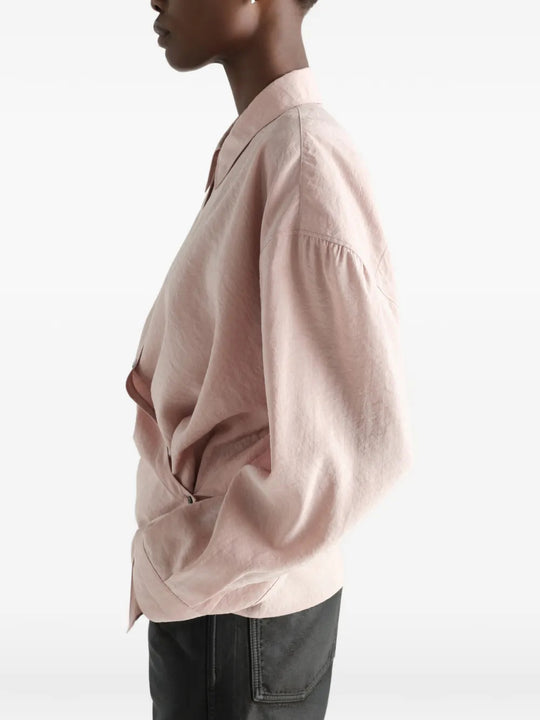 Pink dress worn by a person, showing the dress fit