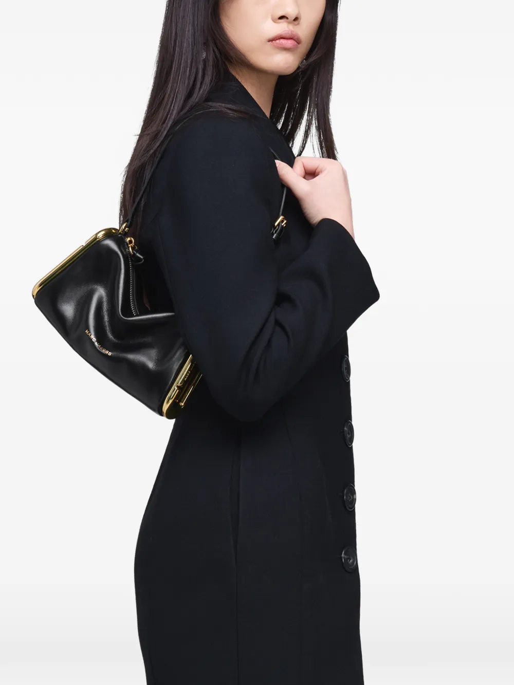 Black bag worn by a person, showing the bag fit