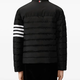 Black jacket worn by a person, showing the jacket fit