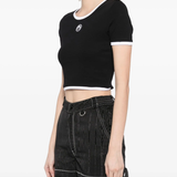 black top worn by a person, showing the top  fit