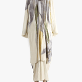 Tan top worn by a person, showing the top's fit