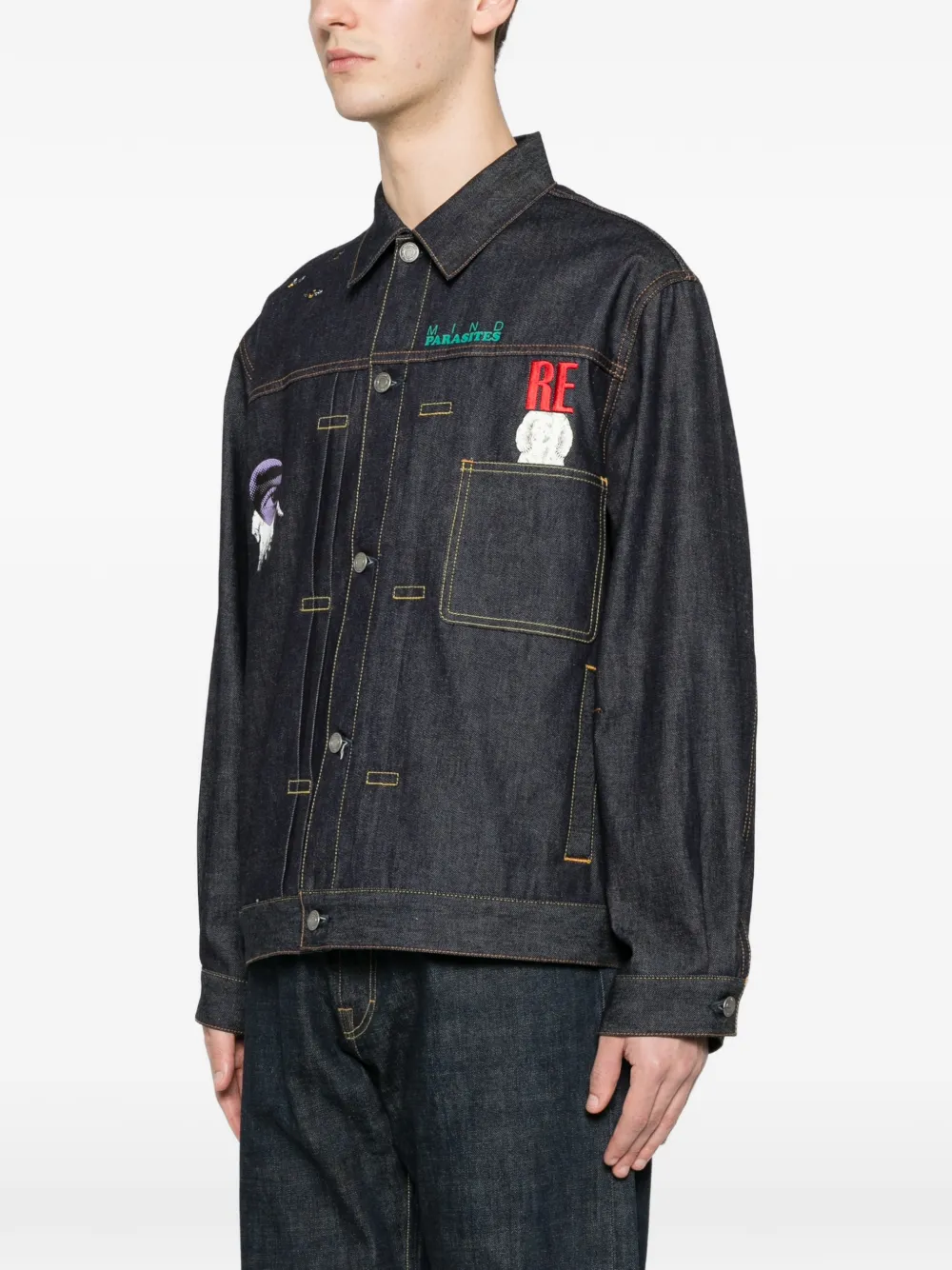 Blue jacket worn by a person, showing the  jacket fit