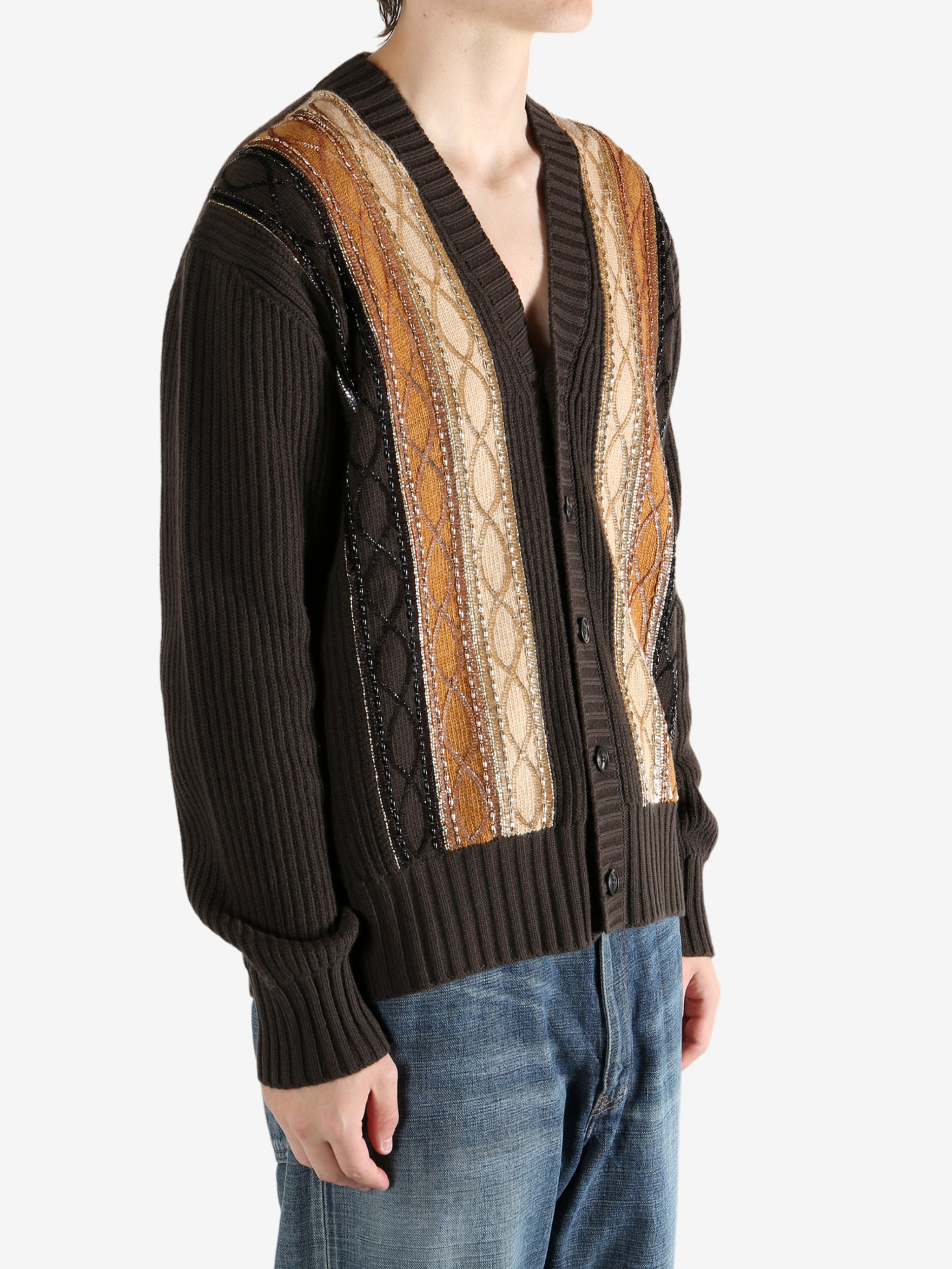 Brown sweater worn by a person, showing the sweater fit