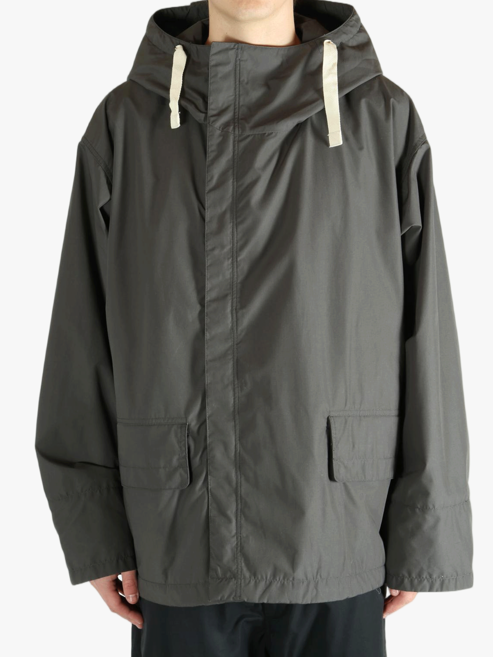 Grey jacket worn by a person, showing the jacket's fit