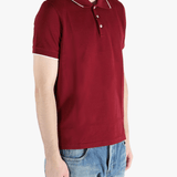 Red shirt worn by a person, showing the fit